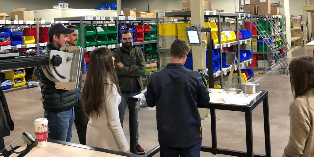 group of people working and talking
