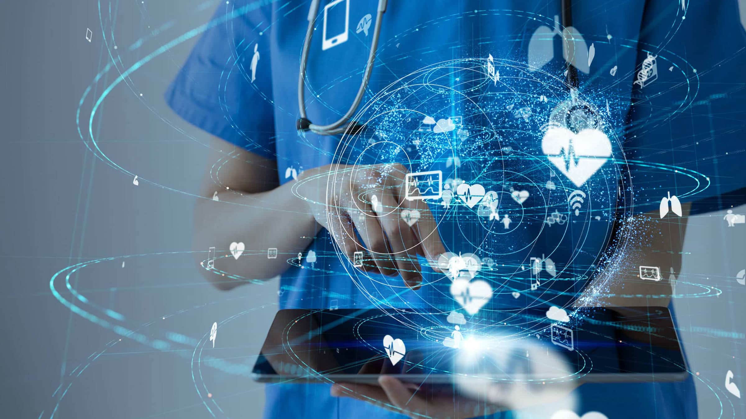 Photo of a medical professional uisng a tablet