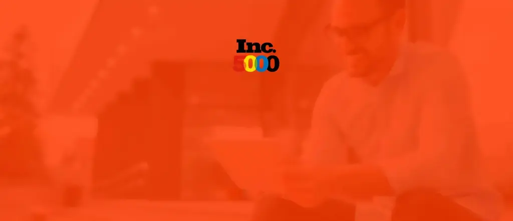 Man using tablet in background with orange overlay