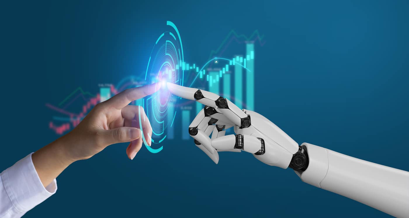 A robotic hand and a human hand touching a digital interface with futuristic data visualization.