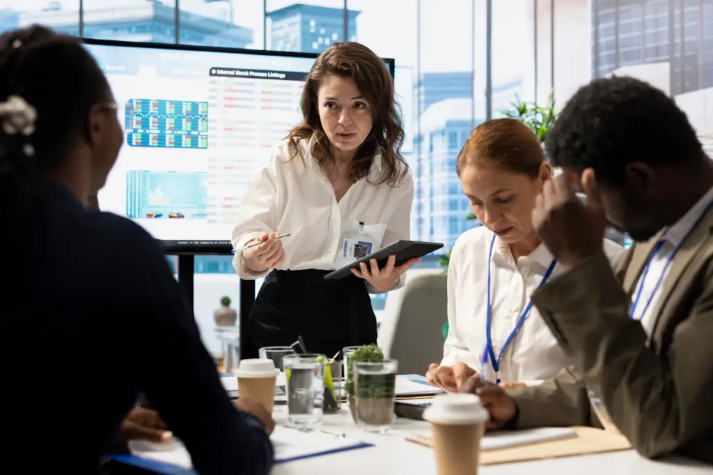 Compliance team analyzing AI-generated incident data and risk categorization metrics during RadarFirst implementation