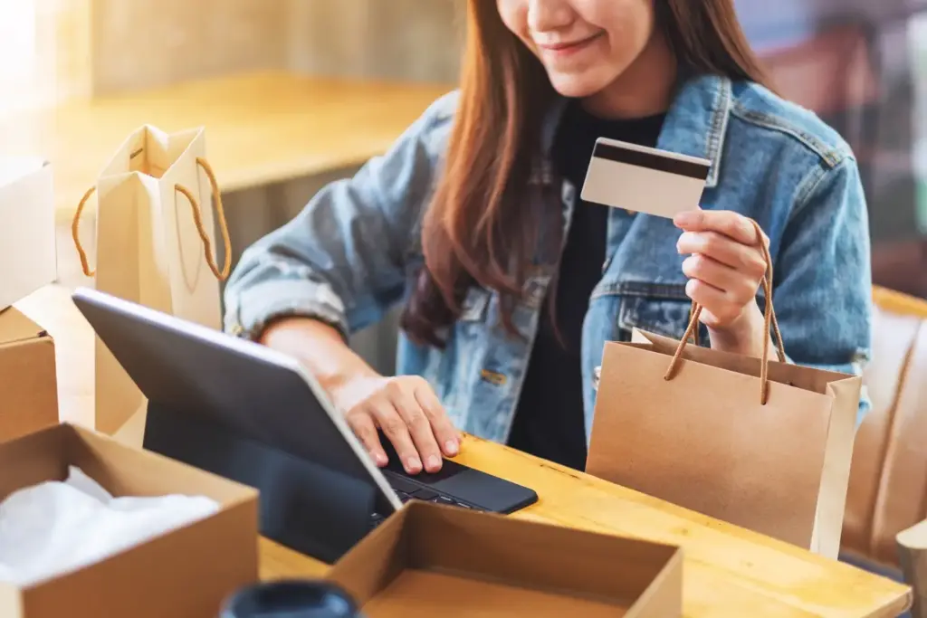 Customer making a seamless online purchase with a credit card - unosquare eCommerce Case Study