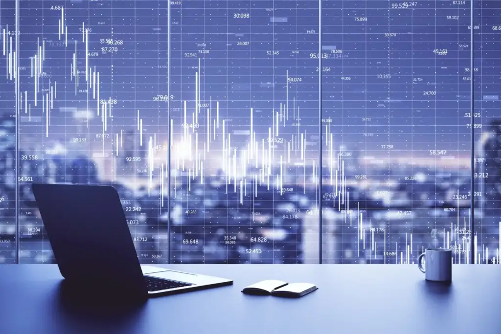 Laptop on a desk displaying global data analytics and performance metrics representing scalable eCommerce infrastructure